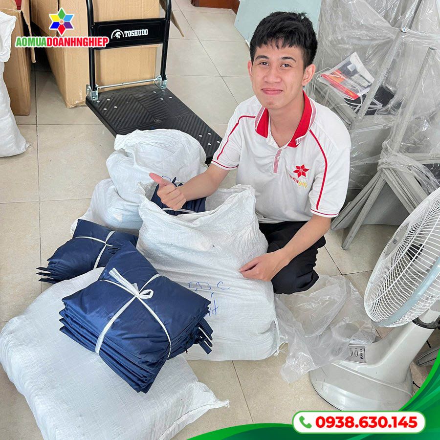 Kiểm tra thiết kế và gia công áo mưa Thương Mại Dịch Vụ